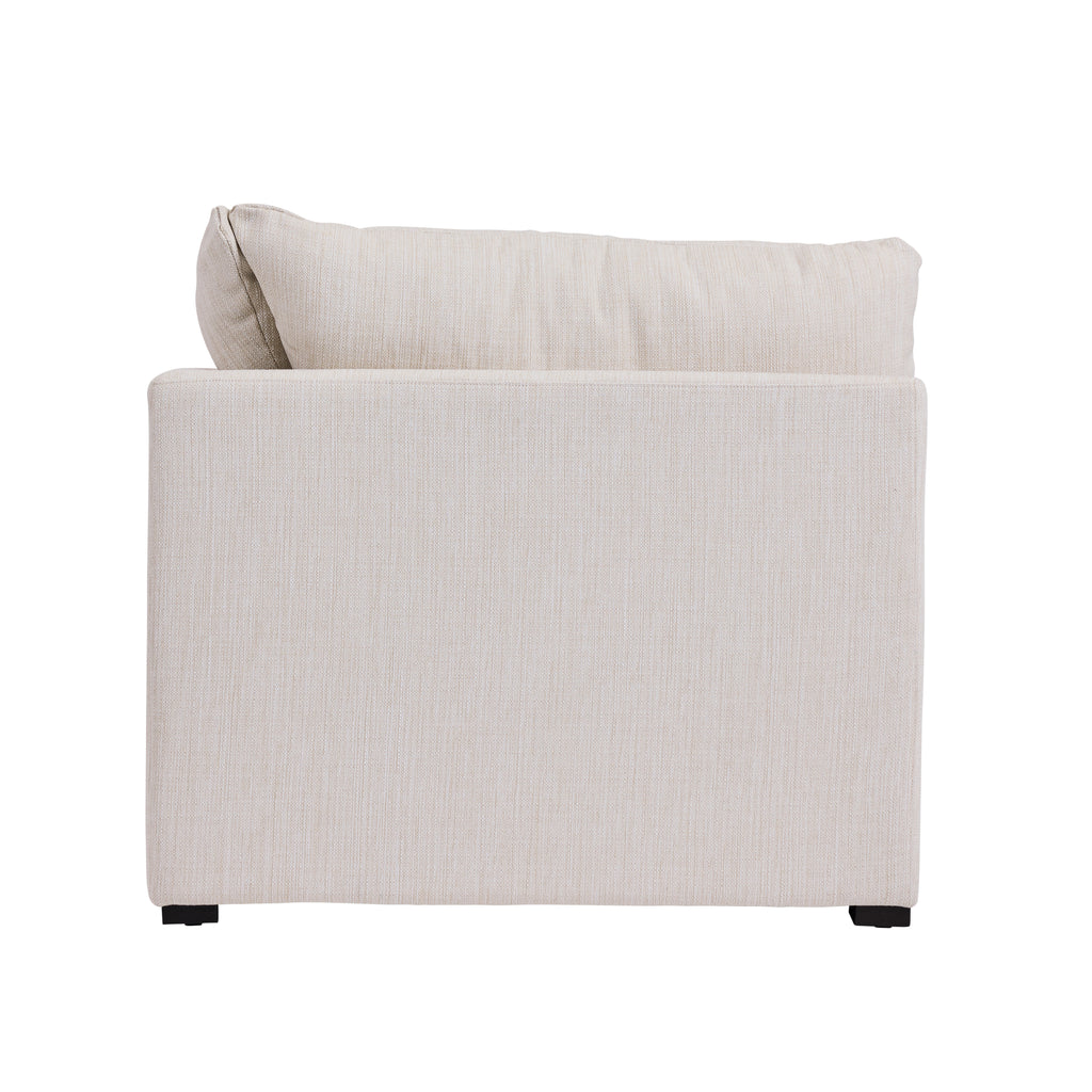 Back view of a cream colored corner piece for an outdoor sectional