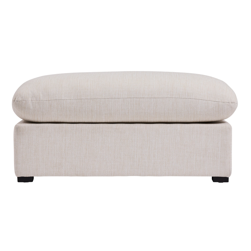 Side view of a cream colored ottoman piece for an outdoor sectional